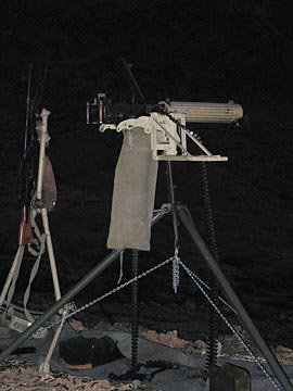 A big gun. At night.