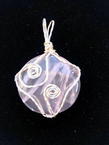 Rose Quartz wrapped in Silver